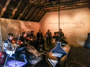 A ceilidh band performs in the Barn