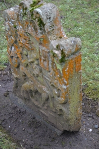 Headstone from Alloway Kirk that shows a blacksmith shoeing a horse