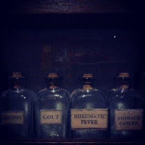 Collection of Robert Burns's many medicine bottles at the museum.