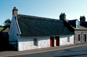 An exterior view of the thatched Souter Johnnie's Cottage, built in 1785.